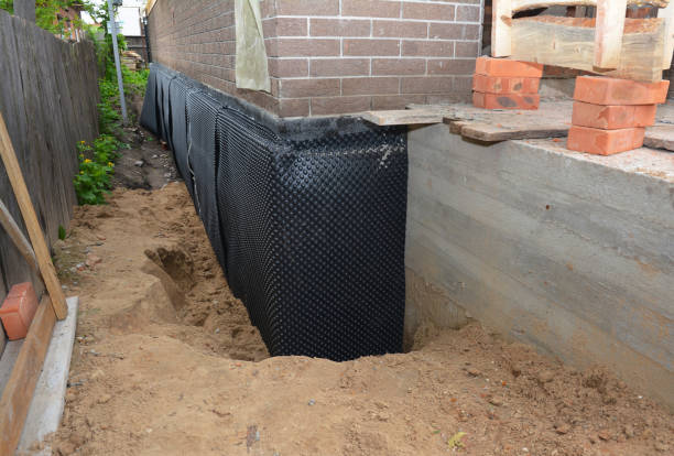 Happy homeowners after waterproofing job in Fremont